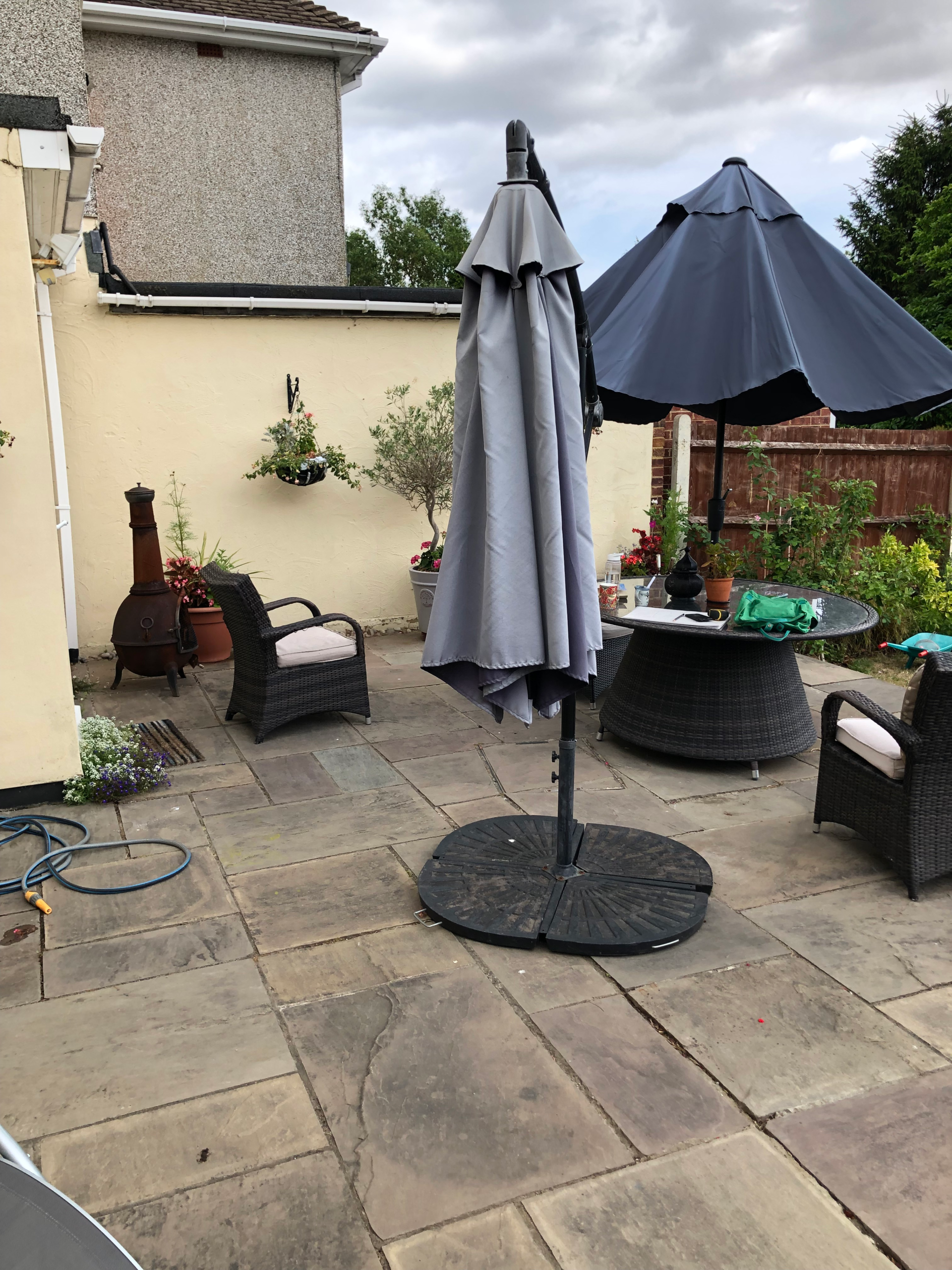 Before the transformation - the Bexley patio Before - the tired paved Bexley patio with old furniture prior to its Moroccan-inspired redesign